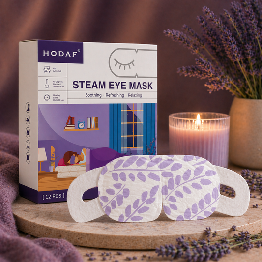 Lavender steam eye mask with product box in cozy evening setting with candle and purple tones for relaxation