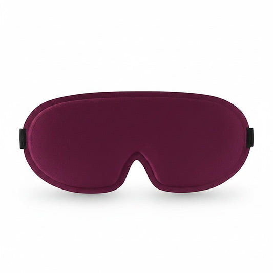 SlumberHush DeepShield sleep mask in deep plum, contoured for comfort and total blackout.