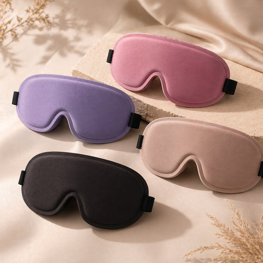 SlumberHush DeepShield sleep masks in purple, pink, beige, and black. Contoured design for comfort and light blocking.