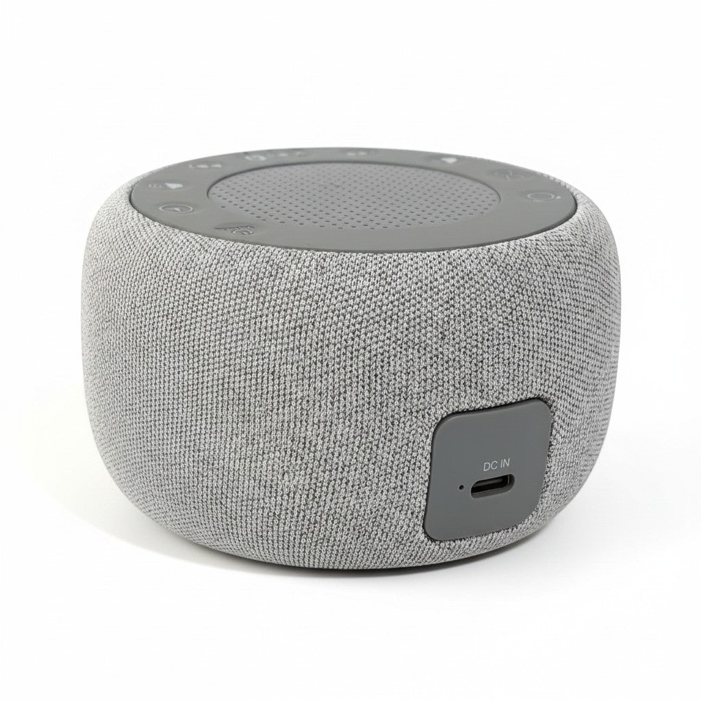 SlumberHush Pro Sleep Machine, grey fabric, portable sound machine with top controls and DC input.