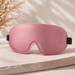 DeepShield sleep mask in soft pink with contoured blackout design on a neutral premium background