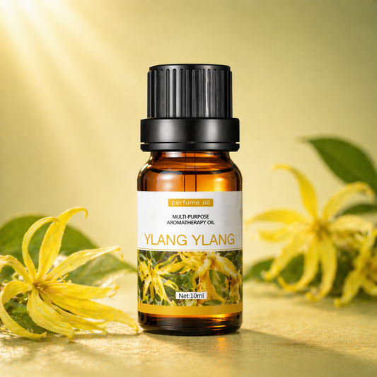 Amber glass ylang ylang oil bottle with yellow flowers and soft green-yellow background