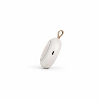 SlumberHush SoundCore baby sleep machine, white portable sound device with tan loop and USB-C port.