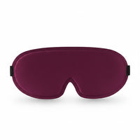 SlumberHush DeepShield sleep mask in deep plum, contoured for comfort and total blackout.