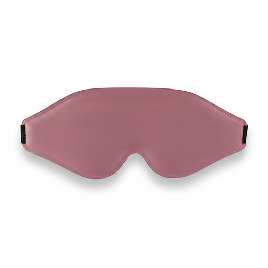 SlumberHush DeepShield sleep mask in dusty rose, contoured for comfort and total blackout.