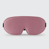 SlumberHush DeepShield sleep mask in dusty rose, contoured for comfort and total blackout.
