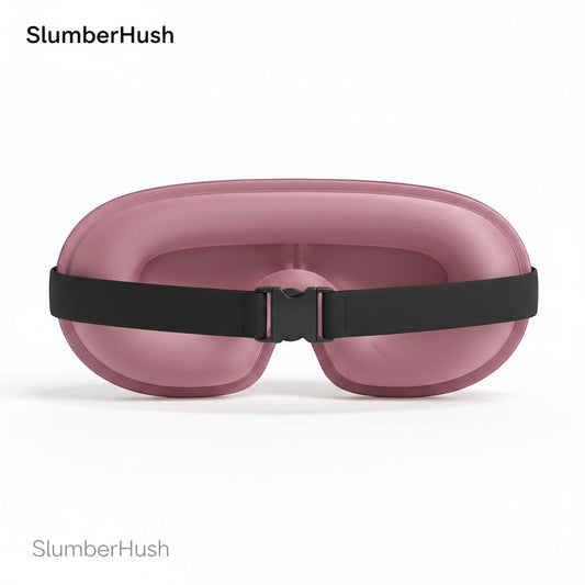 SlumberHush DeepShield sleep mask in dusty rose with adjustable black strap and buckle.