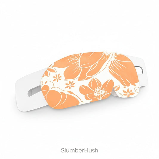SlumberHush WarmEye steam mask with an orange floral pattern on a white background.