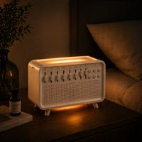 SlumberHush SoundCore white humidifier and sound machine with adjustable sliders and light on bedside table.