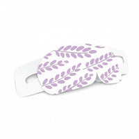 SlumberHush WarmEye steam mask with a delicate purple leaf pattern on white.