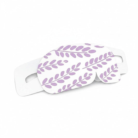 SlumberHush WarmEye steam mask with a delicate purple leaf pattern on white.